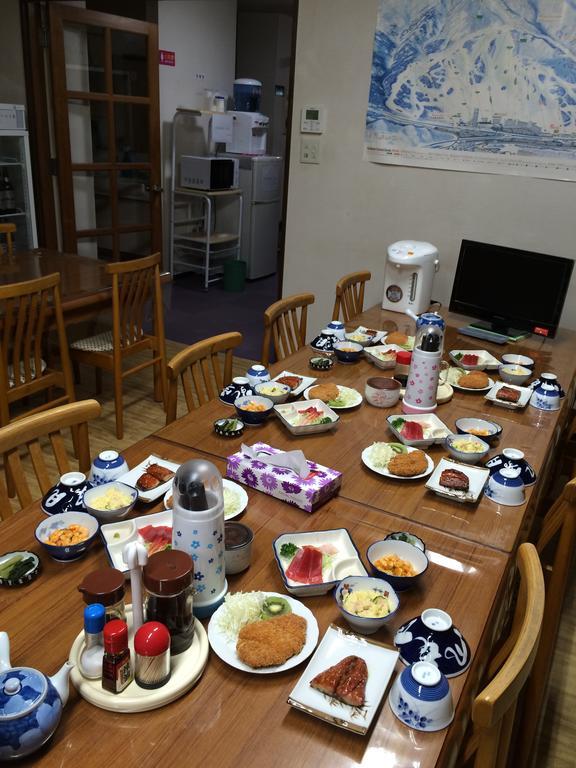 Hôtel Onsen Minshuku Yutakaya à Yuzawa  Extérieur photo